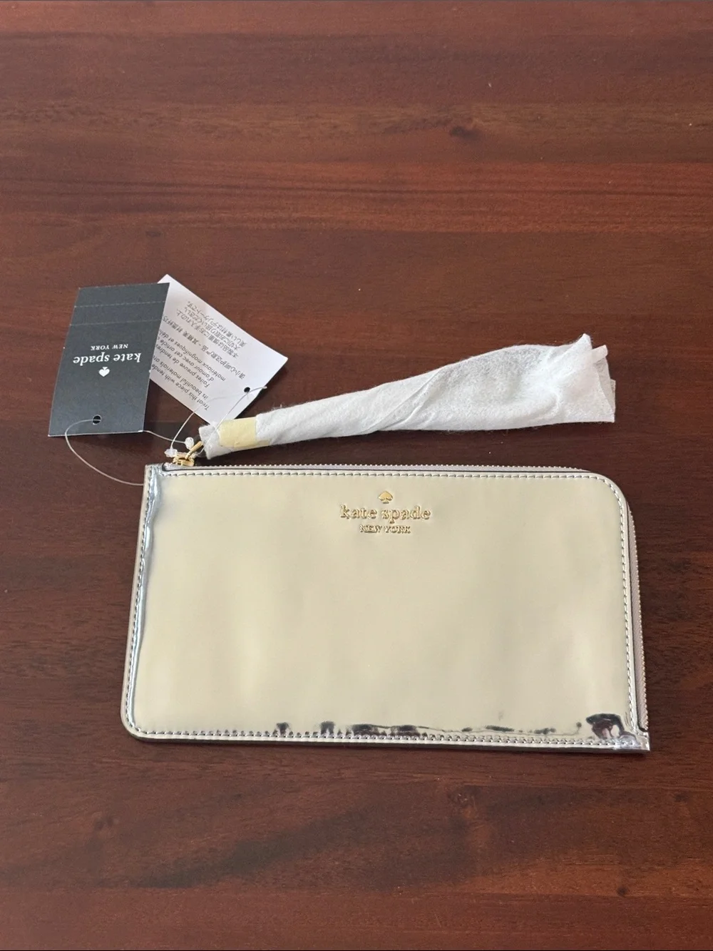 kate spade New York Lucy Metallic Silver L Zip-Around Wristlet new